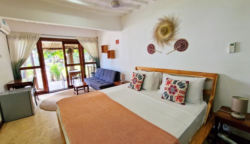 Habitación Deluxe doble, 1 cama de matrimonio con sofá cama, vistas al jardín