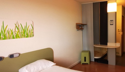 Habitación triple, varias camas