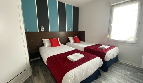 Habitación con 2 camas individuales