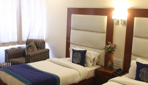 Habitación cuádruple Premium, 1 cama de matrimonio, vistas a la ciudad, planta ejecutiva