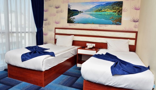 Habitación con 2 camas individuales