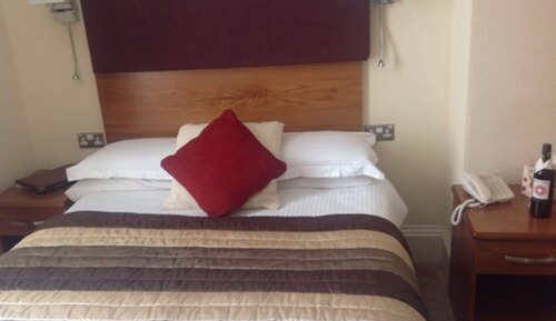 Habitación cuádruple estándar, varias camas