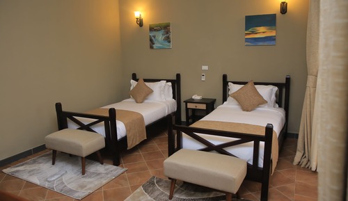 Habitación con 2 camas individuales, vistas al jardín