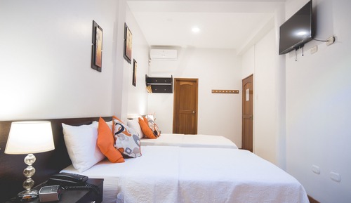 Habitación superior con 2 camas individuales, 2 camas dobles