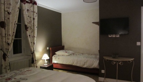 Habitación triple, vistas al jardín