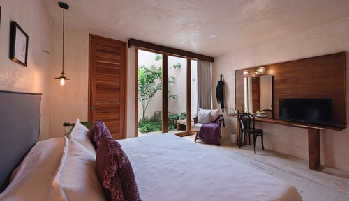 Habitación Deluxe, 1 cama doble, vistas a la piscina, en la zona del jardín