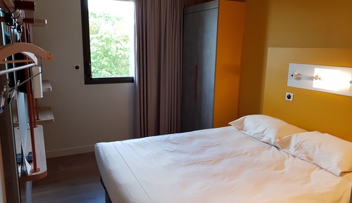 Habitación triple, varias camas