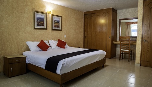 Habitación Superior, 1 Cama King y 1 Cama Matrimonial