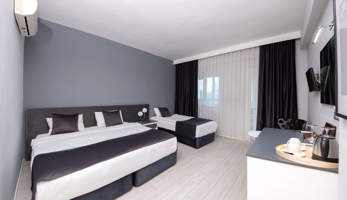 Habitación triple Deluxe