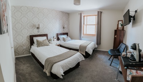 Habitación con 2 camas individuales