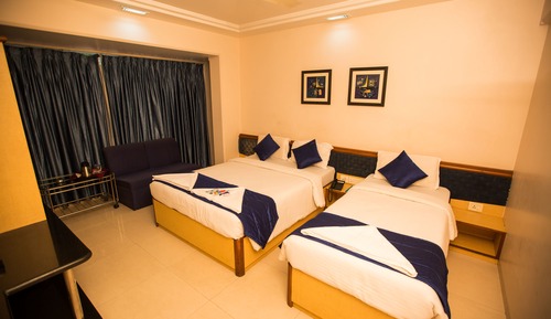 Habitación triple Deluxe