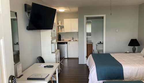 Habitación con 2 camas individuales, 2 camas de matrimonio, frigorífico y microondas (Rm 15)