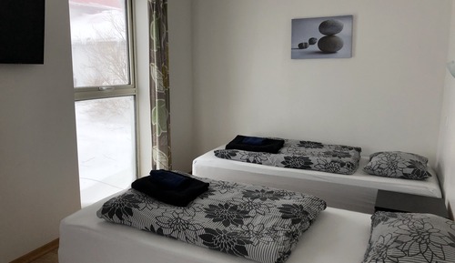 Habitación superior con 1 cama doble o 2 individuales, baño privado