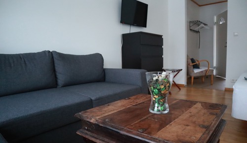 Habitación superior con 1 cama doble o 2 individuales, baño privado (Plus)