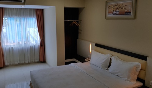 Habitación Deluxe con 1 cama doble o 2 individuales