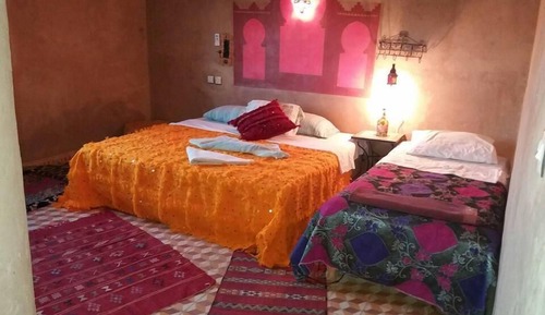 Habitación cuádruple, varias camas