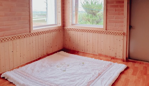 Casa tradicional, en edificio anexo