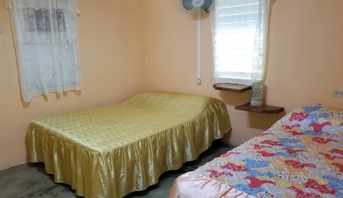 Habitación familiar doble, vistas al jardín