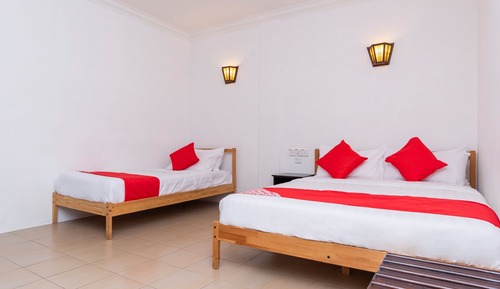 Habitación triple Deluxe, varias camas