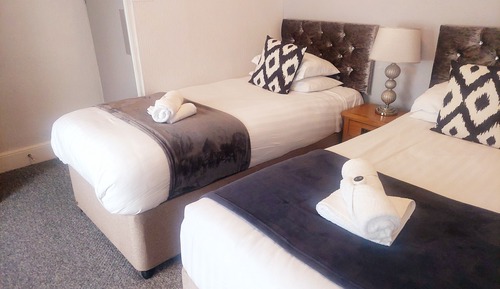 Habitación con 2 camas individuales