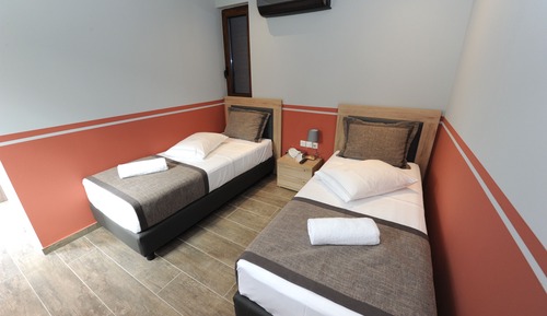 Habitación doble, varias camas