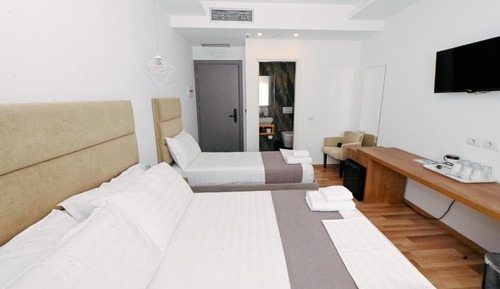 Habitación triple Deluxe, balcón