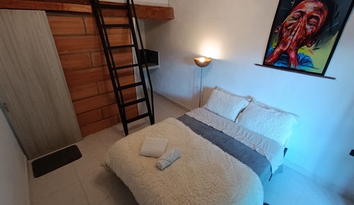 Habitación cuádruple familiar, varias camas, vistas al jardín
