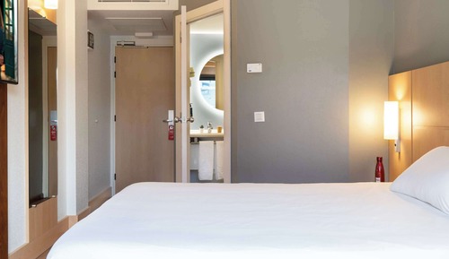 Habitación, varias camas