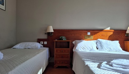 Habitación triple, vistas al mar