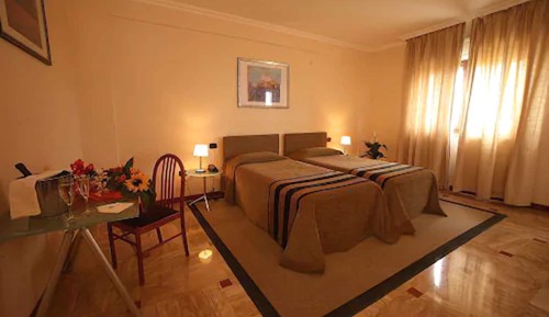 Habitación estándar con 1 cama doble o 2 individuales