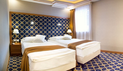 Habitación Confort con 1 cama doble o 2 individuales