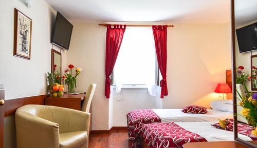 Habitación económica con 1 cama doble o 2 individuales, vistas a la ciudad