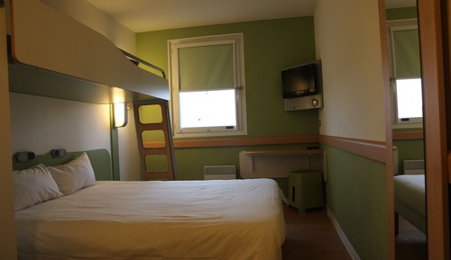 Habitación triple, varias camas