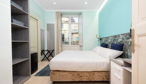 Habitación Deluxe con 1 cama doble o 2 individuales, 2 camas individuales, vistas a la ciudad