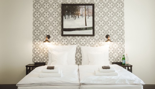 Habitación junior con 1 cama doble o 2 individuales, 1 cama de matrimonio