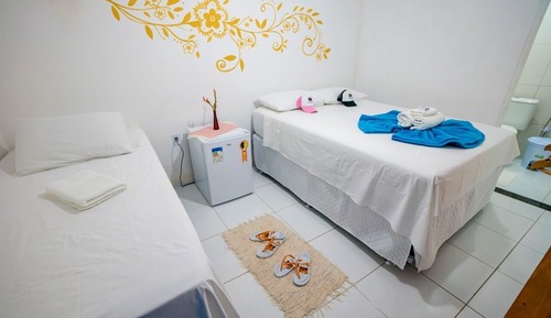 Habitación triple familiar, vistas al jardín