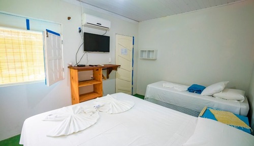 Habitación triple familiar, vistas al jardín