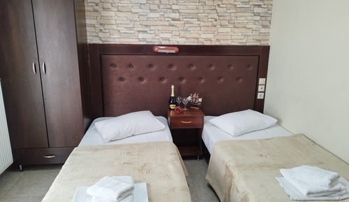 Estudio, 2 camas individuales