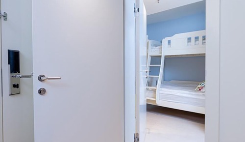 Two Family Rooms with Connecting Door 62m² Courtyard/Park View with Balconies