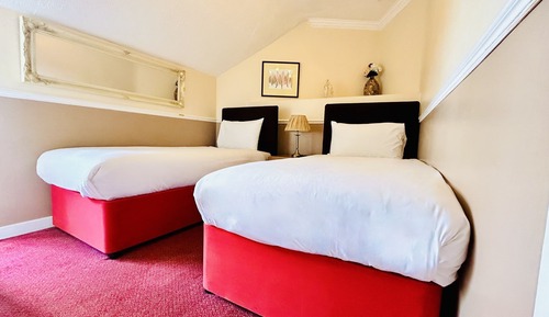 Habitación con 2 camas individuales