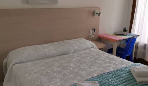 Habitación triple, vistas al jardín