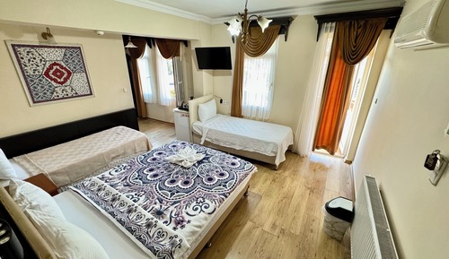 Habitación cuádruple Deluxe