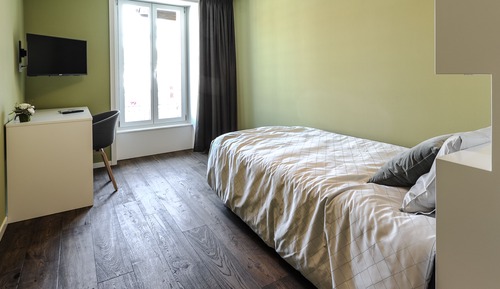 Habitación Business individual, baño compartido