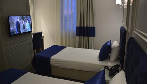 Habitación estándar con 1 cama doble o 2 individuales