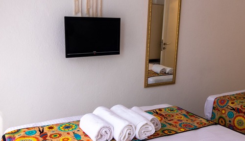 Habitación triple, vistas al jardín
