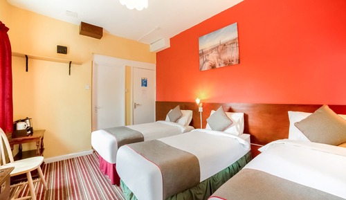 Habitación triple estándar, varias camas