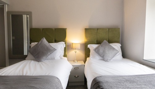 Habitación con 2 camas individuales