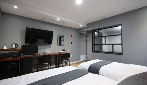 Habitación con 2 camas individuales