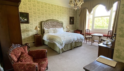 Suite romántica, baño privado, vistas al jardín (Victoria)