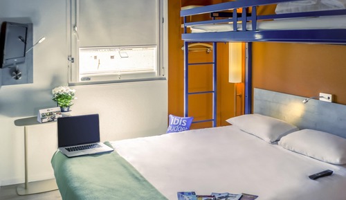 Habitación triple, varias camas